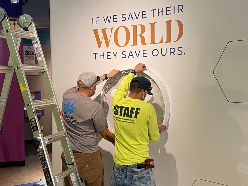 Brave Exhibits Staff works